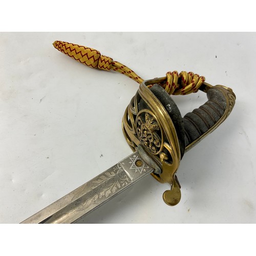 129 - 1854 PATTERN OFFICER’S SWORD, BRASS BASKET HILT WITH ROYAL CIPHER, WIRE BOUND FISH SKIN GRIP, ETCHED... 