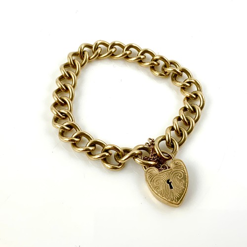 609 - 9CT GOLD CURB BRACELET HAVING 9CT GOLD HEART SHAPED FASTENER, APPROXIMATELY 37 g