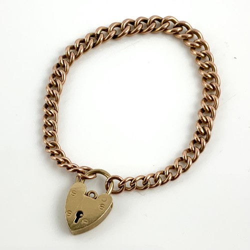 607 - 9ct GOLD BRACELET WITH HEART SHAPED FASTENER, APPROX. 17g