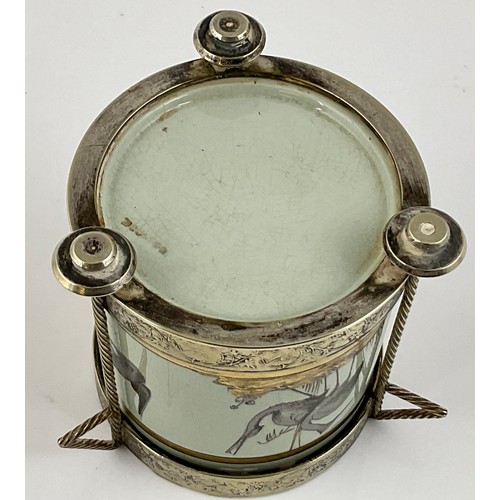 343 - SILVER PLATED PRESERVE JAR WITH IMPRESSED DOULTON MARK, DECORATED WITH IMAGE OF STORKS IN THE STYLE ... 