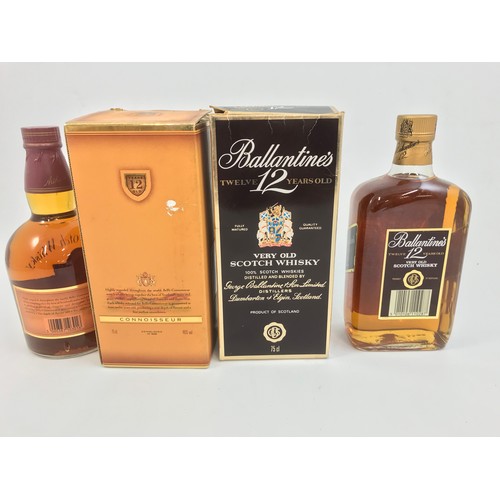 11 - A BOXED BOTTLE OF BALLINTINES 12 YEAR OLD SCOTCH WHISKY WITH A BOXED BOTTLE OF BELL'S CONISSEUR