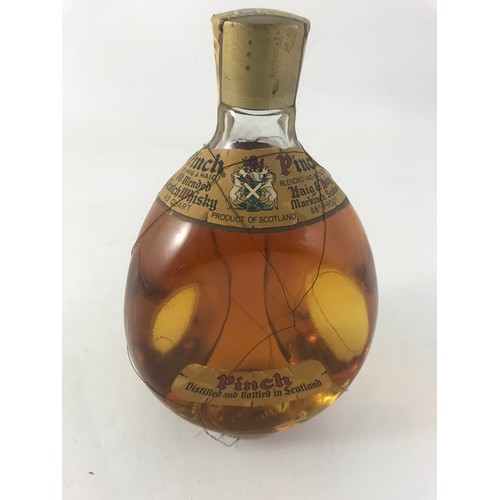 24 - A DIMPLE BOTTLE OF PINCH SCOTCH WHISKEY, BY HAIG & HAIG, 4/5 QUART, UNOPENED