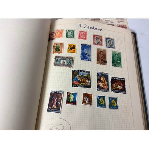 376 - STAMP INTEREST, SPARCE GREEN ALBUM WITH LIMITED WORLD STAMPS,