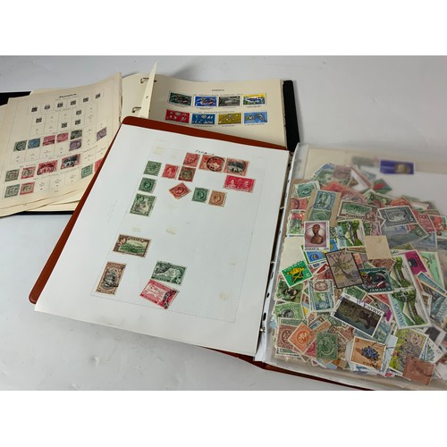 369 - STAMP INTEREST, 2 ALBUMS OF JAMAICA STAMPS, SOME LOOSE & SOME ON PAPER