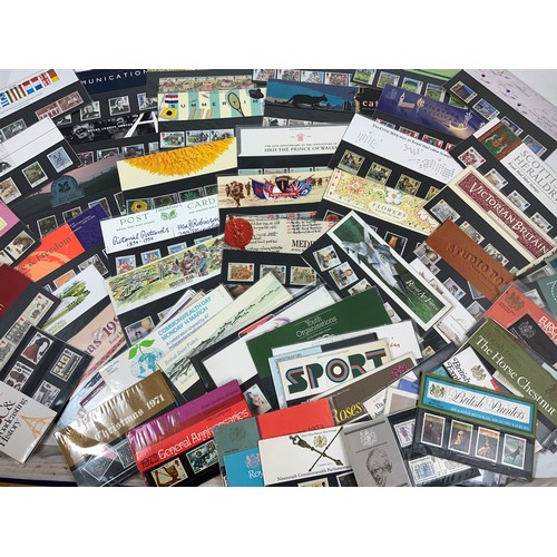 383 - STAMP INTEREST A LARGE NUMBER APPROX. 200 PRESENTATION PACKS, PLUS THE MILLENNIUM COLLECTION, 25 PRE... 