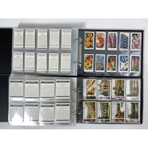 291 - 2 ALBUMS OF CIGARETTE CARDS IN SLIP CASES. ONE ALBUM WITH CARDS FROM A RANGE OF MANUFACTURERS, INC. ... 