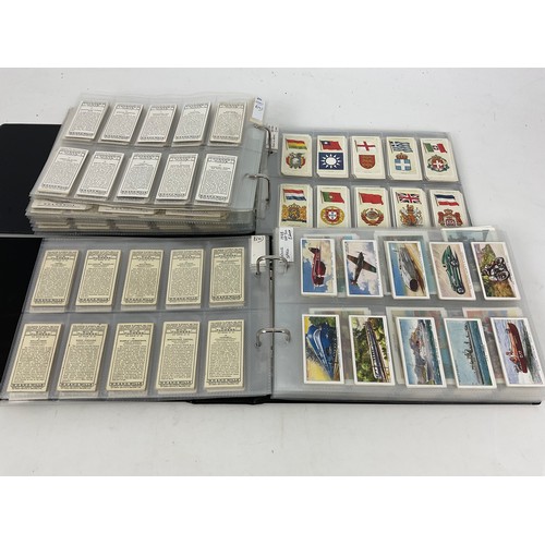 293 - CIGARETTE CARDS, TWO ALBUMS, ONE WITH 24 ORIGINAL SETS IN A SLIP CASE, WILLS PLAYERS, CAT £500, & A ... 