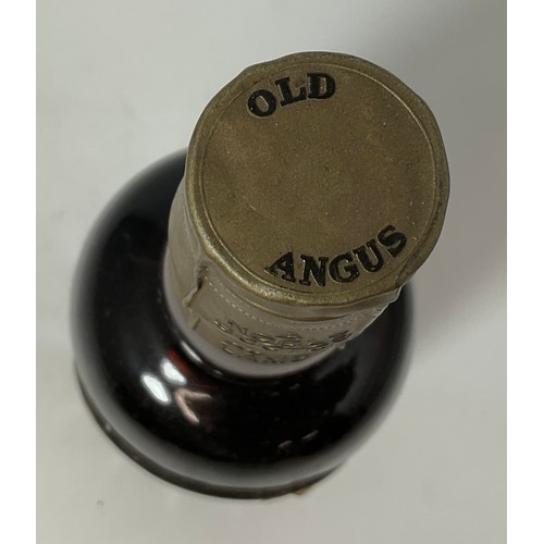 3 - OLD ANGUS LIQUEUR BLENDED SCOTCH WHISKY. DISTILLED BLENDED AND BOTTLED BY TRAIN & MCINTYRE LTD. SAYS... 