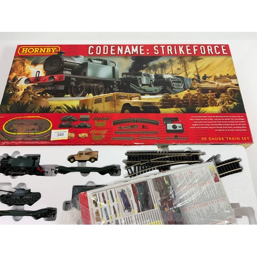 340 - HORNBY BOXED TRAIN SET, R1147 CODENAME STRIKEFORCE, NO CONTROLER. CONTENTS AS SHOWN