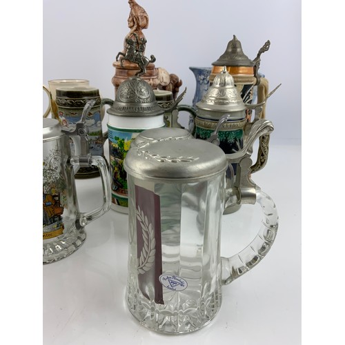 438 - COLLECTION OF STEINS & TANKARDS