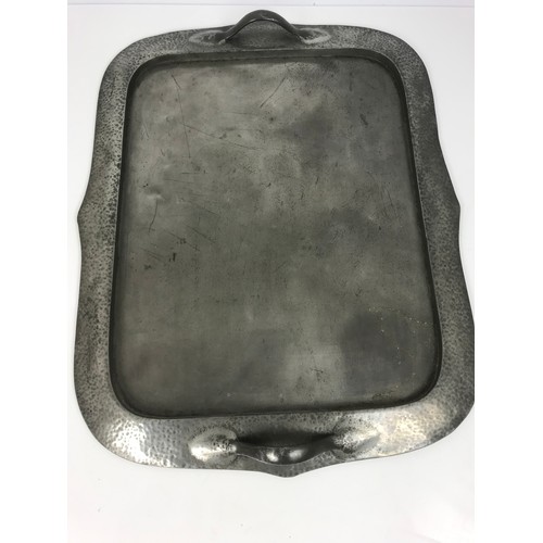 330 - LARGE HAMMERED PEWTER TWO HANDLED TRAY IN THE LIBERTY'S STYLE  62cm LONG