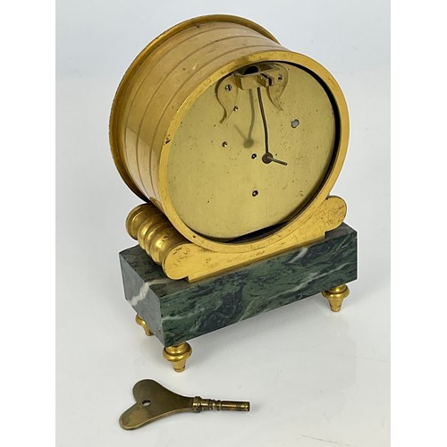 288 - GILT DRUM SHAPED CLOCK WITH WHITE ENAMELLED DIAL ON MARBLE PLINT WITH APPLIED GILT SWAG DECORATION