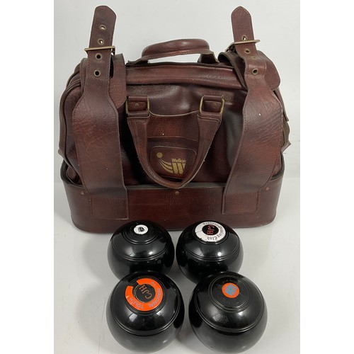 387 - SET OF BOWLS IN BROWN HOLDALL