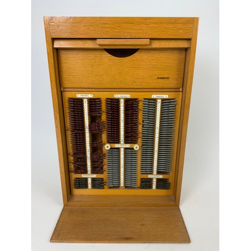 366 - OPTICIANS ‘ESSEL, LIGHT OAK TAMBOUR FRONT LENS CABINET AND CONTENTS 52cm TALL