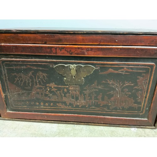 494 - BOX WITH PAINTED ORIENTAL DECORATION AND LIFT OUT RELIEF DECORATED FRONT PANEL, APPROX. 71 cm