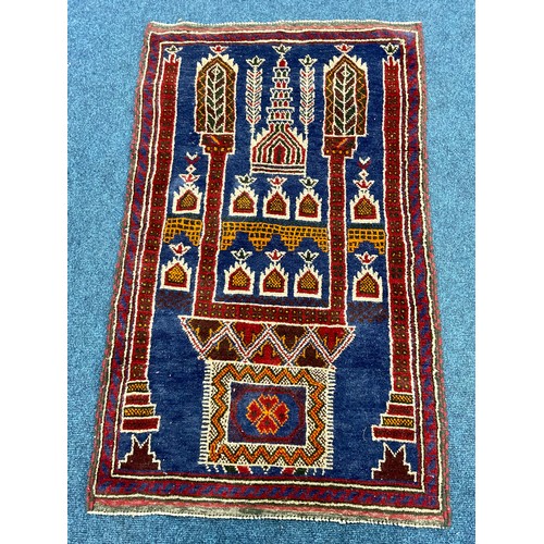 739 - RED AND BLUE GROUND PRAYER RUG, approx. 144 x 86 cm