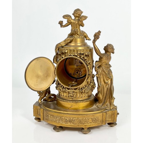 290 - DECORATIVE FRENCH GILT METAL MANTLE CLOCK WITH CHERUB AND MAIDEN DECORATION