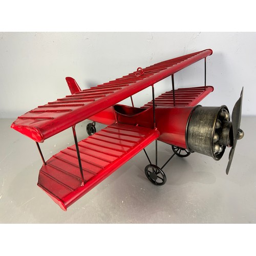 91 - A TIN PLATE MODEL AEROPLANE.