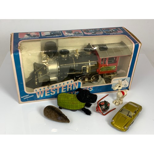 218 - CURIOUS TRAY WITH A BOXED BATTERY OPERATED WESTERN EXPRESS LOCOMOTIVE, CLOCKWORK TINPLATE SCHUCO, WA... 