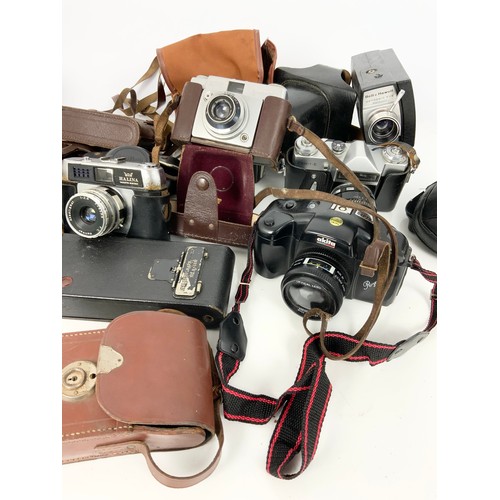 329 - QUANTITY OF VINTAGE CAMERAS INC KODAK, ZENIT , HALINA ETC