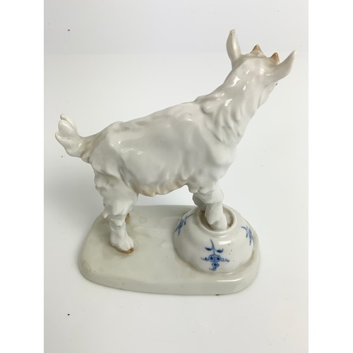 109 - MEISSEN PORCELAIN FIGURE DEPICTING A GOAT ON A BROKEN POT 14cm TALL