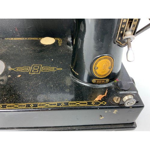 379 - CASED SINGER  221K ELECTRIC SEWING MACHINE WITH A PORTABLE TYPEWRITER