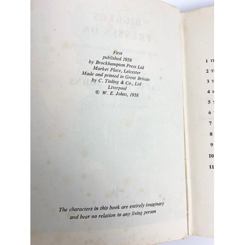 71 - THREE EARLY BIGGLES BOOKS INCLUDING BIGGLES PRESSES ON 1958 FIRST EDITION, BIGGLES SWEEPS THE DESERT... 