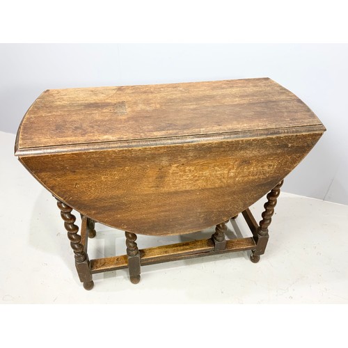 526 - OAK DROP LEAF GATELEG TABLE WITH BARLEY TWIST SUPPORTS