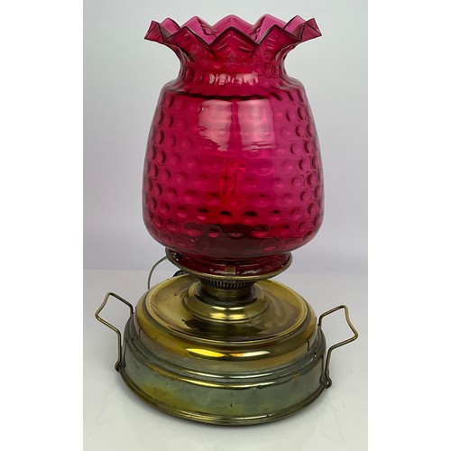 216 - CONVERTED BRASS LAMP WITH CRANBERRY SHADE APPROX 46CM TALL