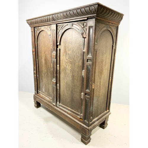 462 - CONTINENTAL, POSSIBLY SPANISH ANTIQUE OAK CUPBOARD/ CABINET WITH DOUBLE DOORS, APPROX. 145 cm wide