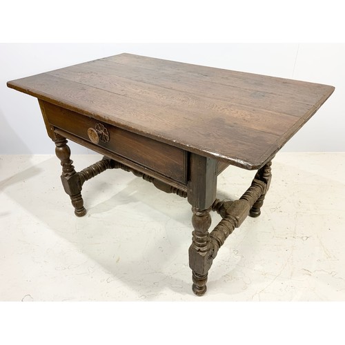 570 - PRIMITIVE OAK SIDE TABLE WITH TURNED BALUSTER LEGS AND STRETCHERS, FRIEZE DRAWER, APPROX. 121 cm wid... 