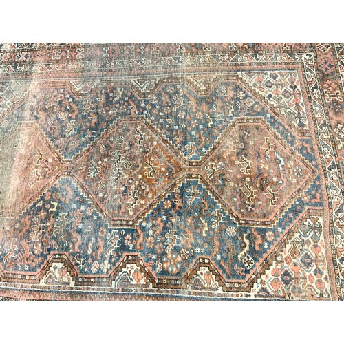 640 - RED GROUND RUG 266cm x 205cm