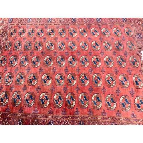 639 - RED GROUND RUG  270cm x 210cm