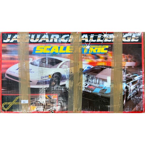 64 - SCALEXTRIC JAGUAR CHALLENGE T/W MICRO SCALEXTRIC JUSTICE LEAGUE. (NOT CHECKED FOR COMPLETENESS)