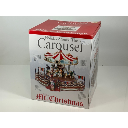 89 - A BOXED ORIGINAL CLASSIC BY MR CHRISTMAS HOLIDAY AROUND THE CAROUSEL, BOXED, ADVISED NEW BUT POSSIBL... 