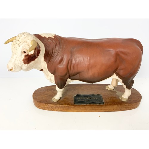 107 - BESWICK CONNOISSEUR MODELS OF BURNHAM BEAUTY SHIRE HORE AND A HEREFORD BULL ON PLINTHS