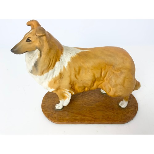 109 - 2 BESWICK MODELS OF COLLIE DOGS ON WOODEN PLINTHS