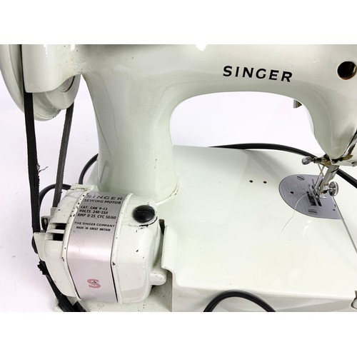 453 - SMALL SINGER SEWING MACHINE IN FITTED CASE