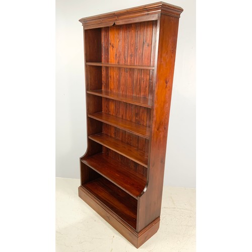 580 - STAINED PINE BOOKSHELVES 189cm TALL