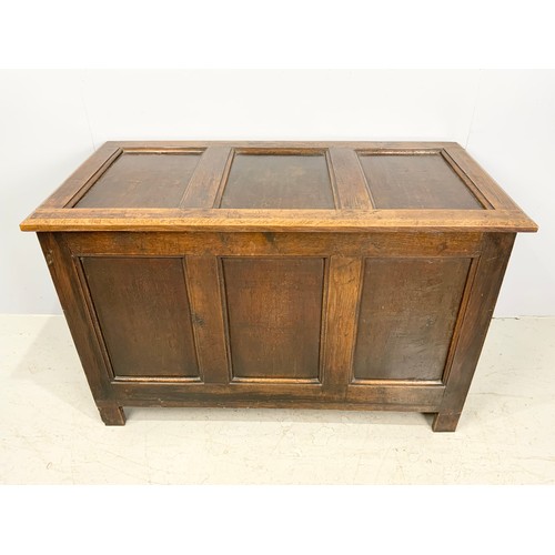 616 - OAK PANELLED BLANKET CHEST ON STILE FEET 115cm LONG