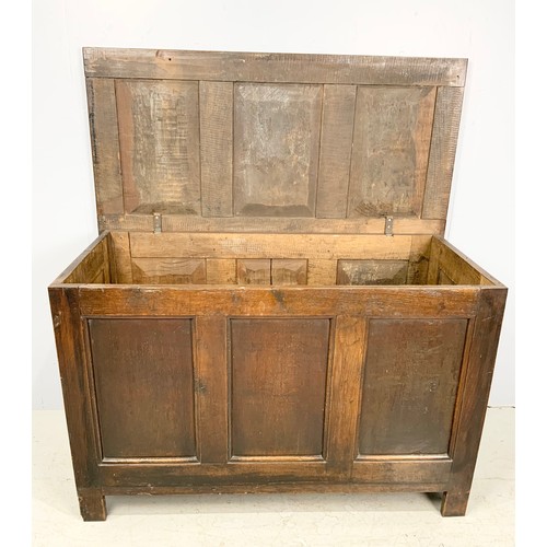 616 - OAK PANELLED BLANKET CHEST ON STILE FEET 115cm LONG