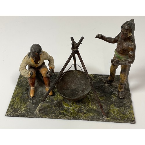 488 - SPELTER FIGURE GROUP DEPICTING 2 NATIVE INDIANS AROUND A FIRE