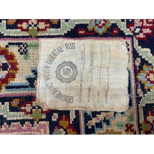 688 - INDIAN HAND WOVEN BLUE GROUND RUG 150cm x 90cm