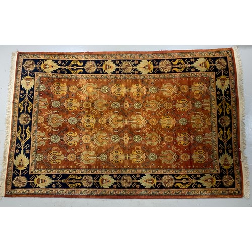 681 - INDIAN RED GROUND RUG 294cm x 192cm