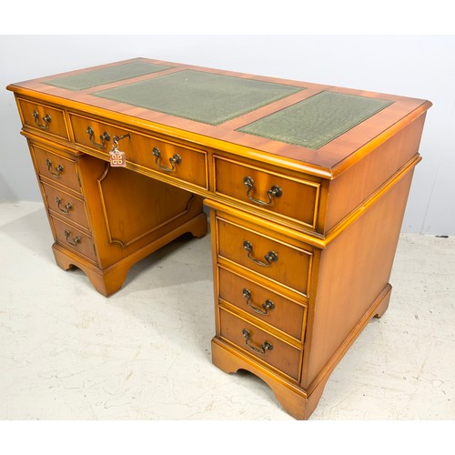 598 - GOOD QUALITY REPRODUCTION YEW WOOD TWIN PEDESTAL DESK WITH TOOLED LEATHER WRITING SURFACE. 122cm x 6... 