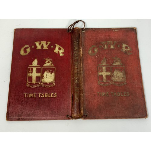 201 - A GREAT WESTERN RAILWAY TIME TABLE COVER, ORNATE WITH THE GWR CREST ON THE COVER T/W A GWR 'A4' UNUS... 