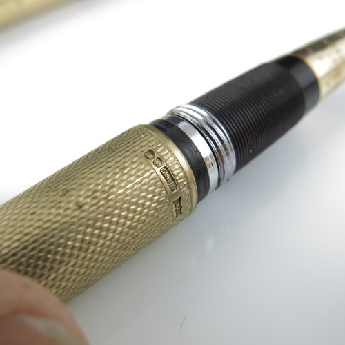 199 - 9CT GOLD CASED SHEAFFER FOUNTAIN PEN WITH ENGINE TURNED DECORATION AND 14K NIB TOGETHER WITH ONE OTH... 