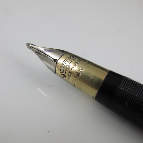 199 - 9CT GOLD CASED SHEAFFER FOUNTAIN PEN WITH ENGINE TURNED DECORATION AND 14K NIB TOGETHER WITH ONE OTH... 