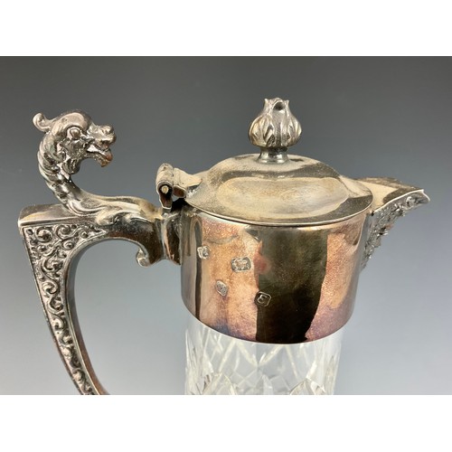 311 - CUT GLASS CLARET JUG WITH SILVER MOUNT AND BACCHUS MASK SPOUT