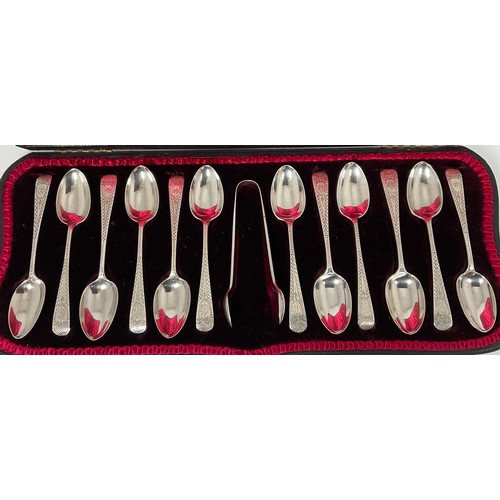 224 - CASED 12 HALLMARKED SILVER TEA SPOONS & TONGS WITH BRIGHT CUT DECORATION  APPROX 170g